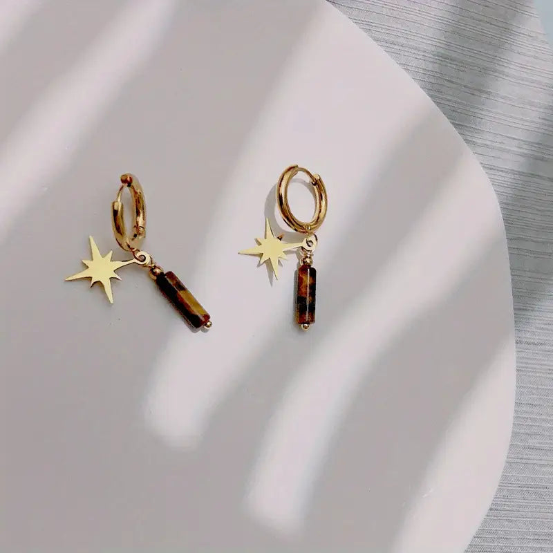 Aretes de piedra café con estrellas